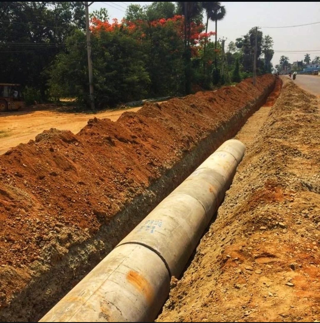 Concrete pipe being laid for canal and pipeline works